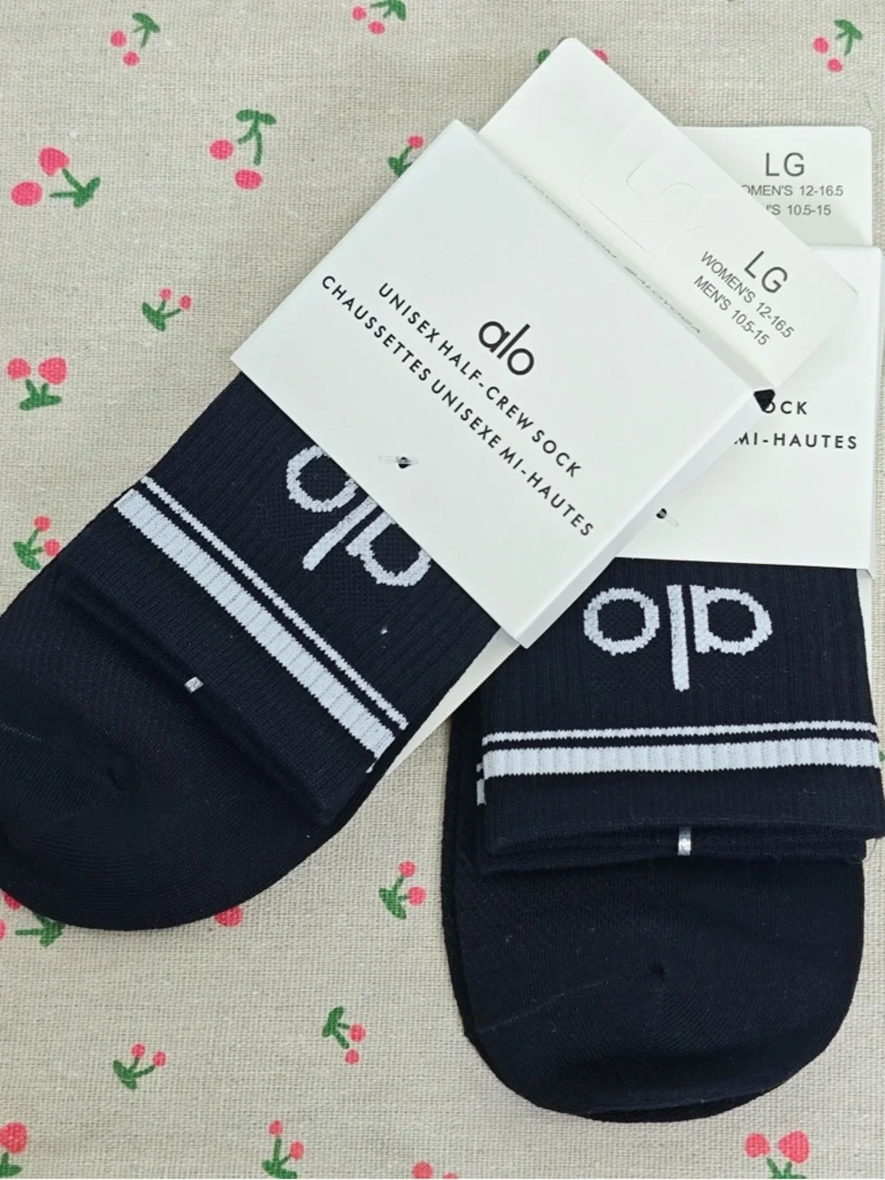 ALO Yoga Black Half-Crew Socks with White Stripes and Logo